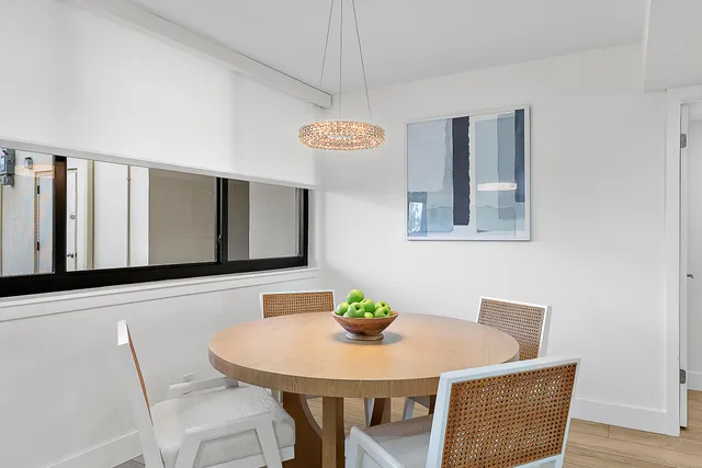 a view of a dining room with furniture