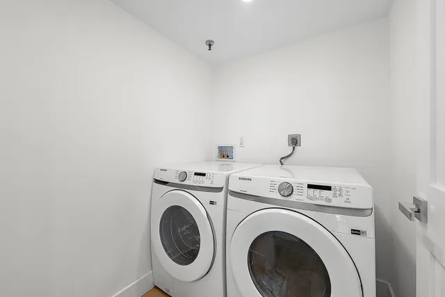 a utility room with dryer and washer