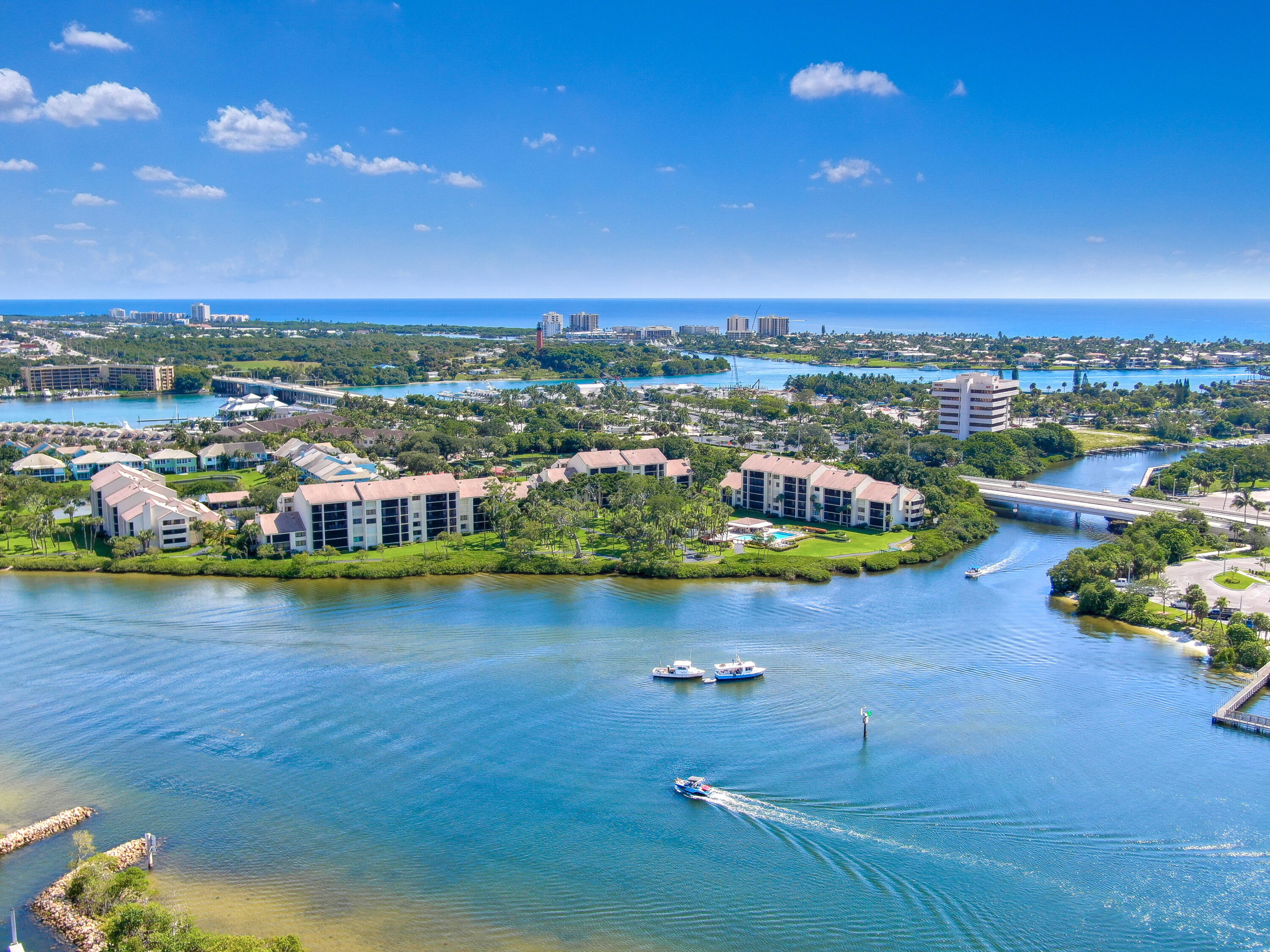 Undisclosed Address Jupiter, FL 33477 - Photo 24 of 28 an aerial view of a houses with a lake view