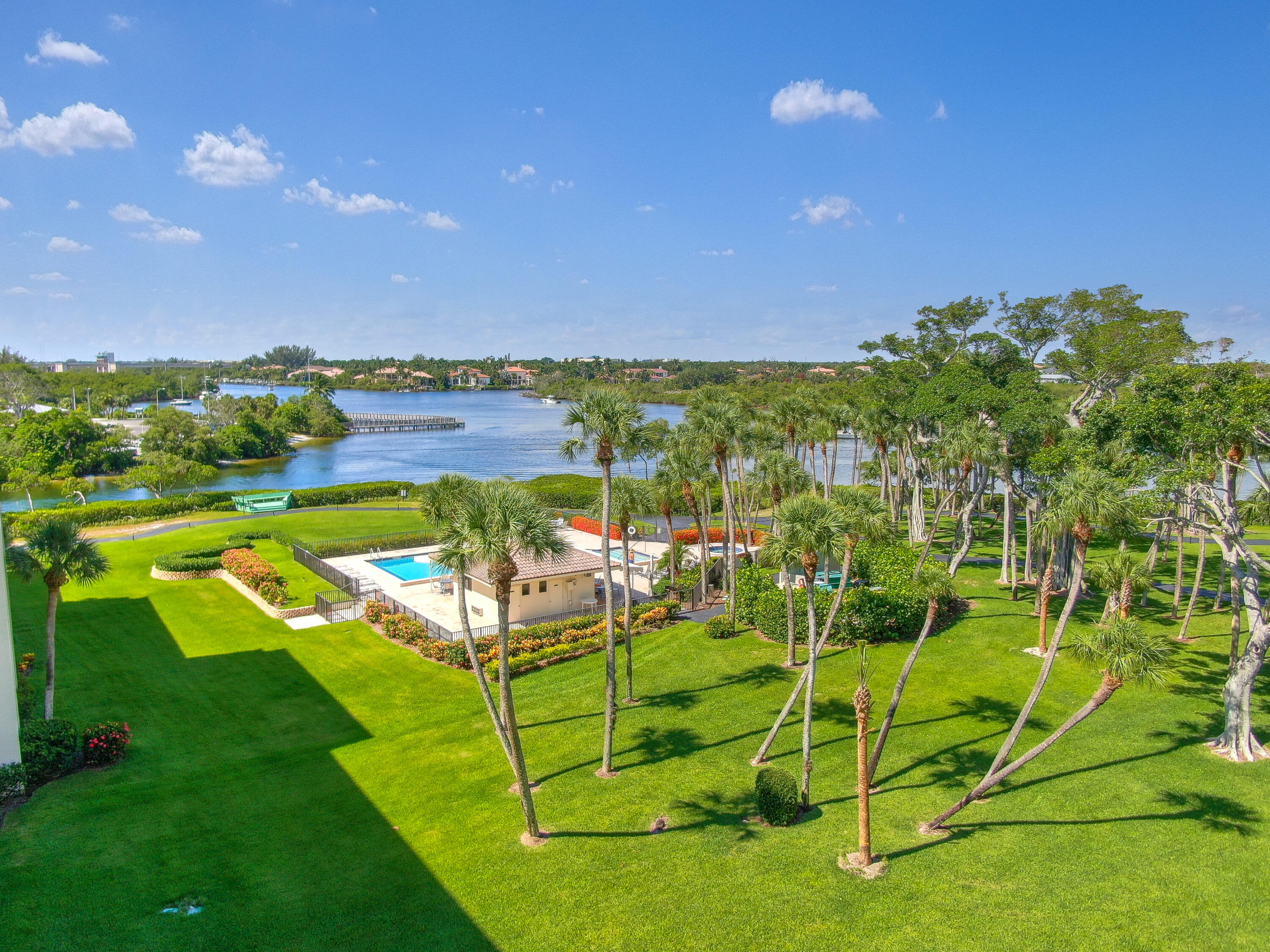 Undisclosed Address Jupiter, FL 33477 - Photo 26 of 28 a view of a big yard with swimming pool