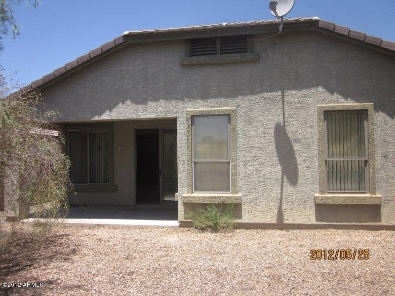 10213 West Payson Road Tolleson, AZ 85353 - Photo 18 of 24 a front view of a house
