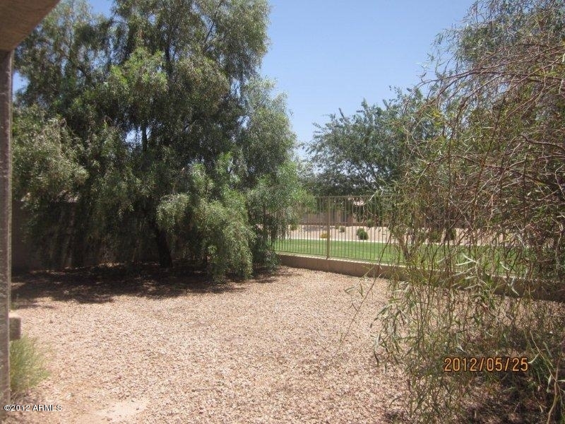 10213 West Payson Road Tolleson, AZ 85353 - Photo 19 of 24 a view of backyard with green space