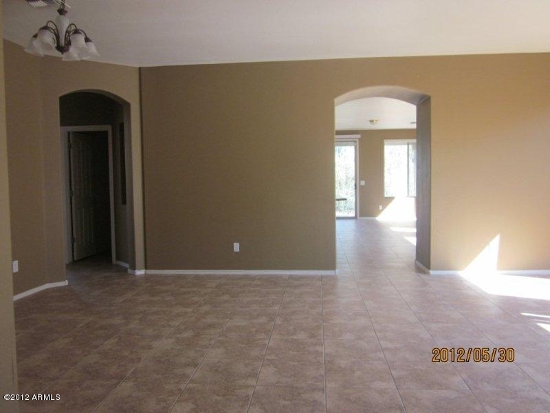 10213 West Payson Road Tolleson, AZ 85353 - Photo 3 of 24 a view of a hallway with a elevator