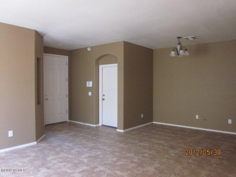 10213 West Payson Road Tolleson, AZ 85353 - Photo 4 of 24 a view of a room with an empty space