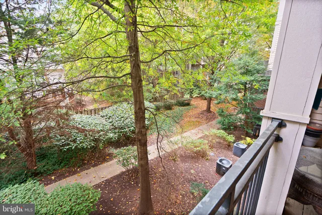 a view of a yard from a balcony