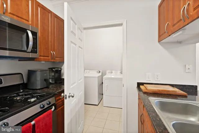 a kitchen with a stove and a microwave