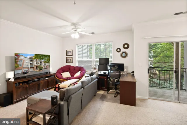 a workspace with furniture and a window