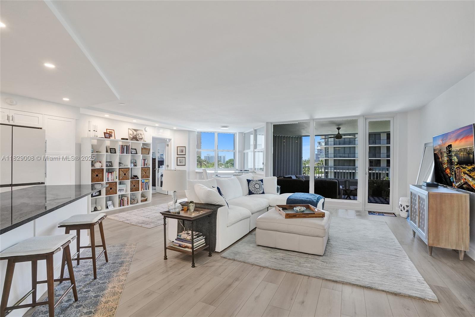 1340 South Ocean Boulevard, Unit 403 Pompano Beach, FL 33062 - Photo 4 of 74 a living room with furniture and a table