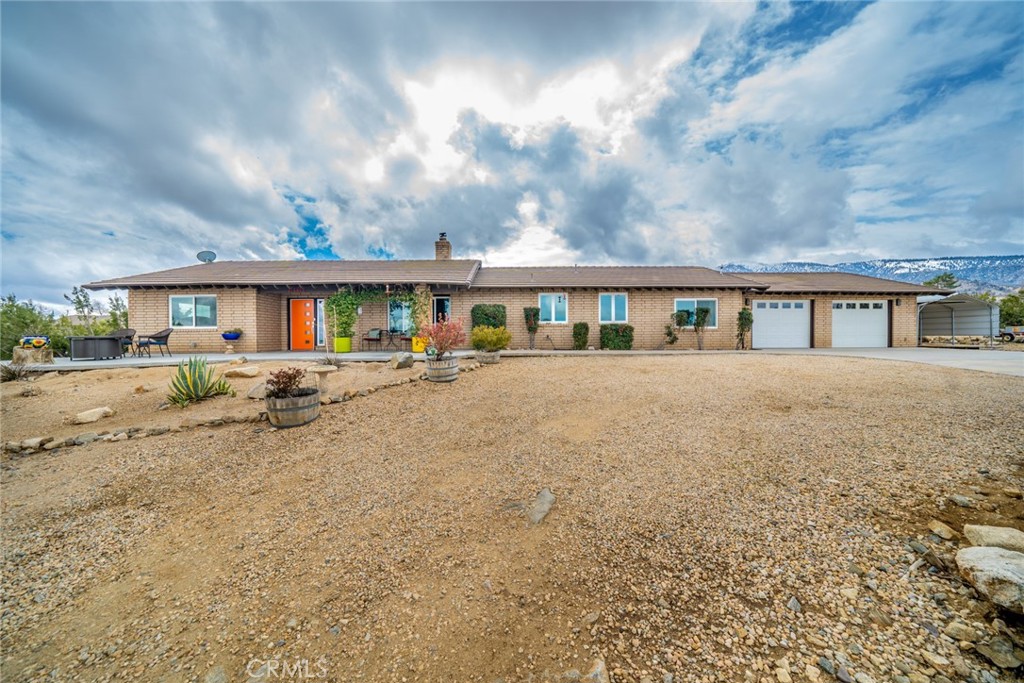1361 Maria Road Pinon Hills, CA 92372 - Photo 1 of 1 a view of house with yard and sitting area