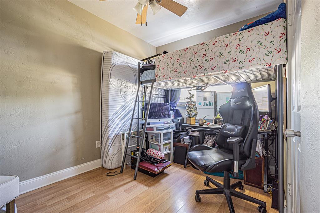 9696 Groveland Street Seminole, FL 33772 - Photo 11 of 22 a view of a room with gym equipment