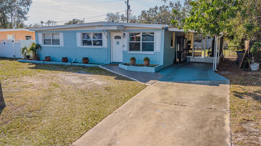 9696 Groveland Street Seminole, FL 33772 - Photo 15 of 22 a view of a house with a patio