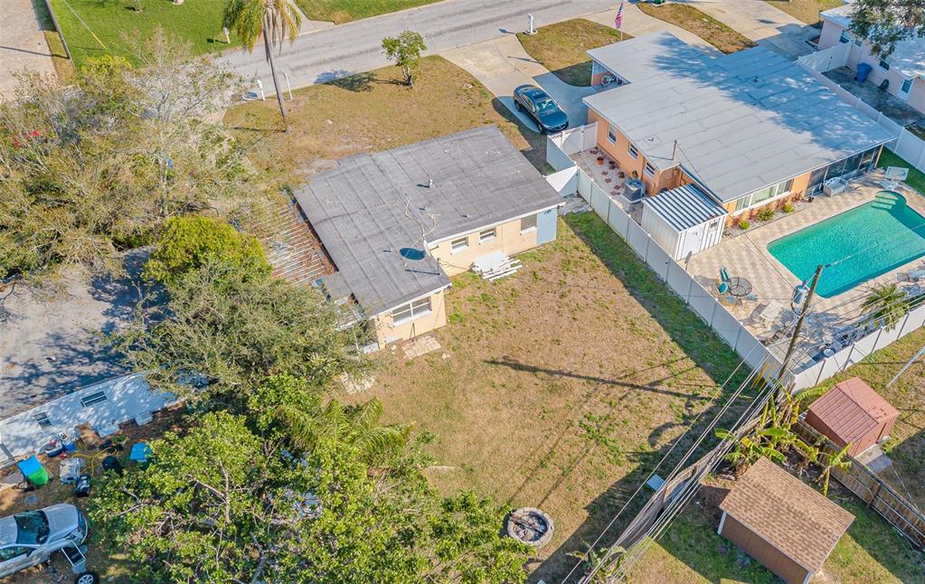 9696 Groveland Street Seminole, FL 33772 - Photo 22 of 22 an aerial view of residential houses with outdoor space