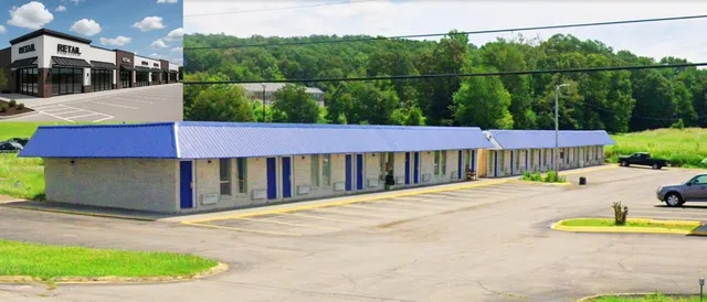 a view of a backyard with a small pool