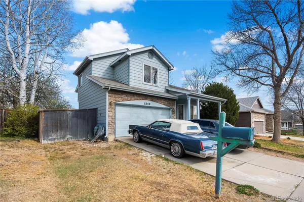 a car parked in front of a house
