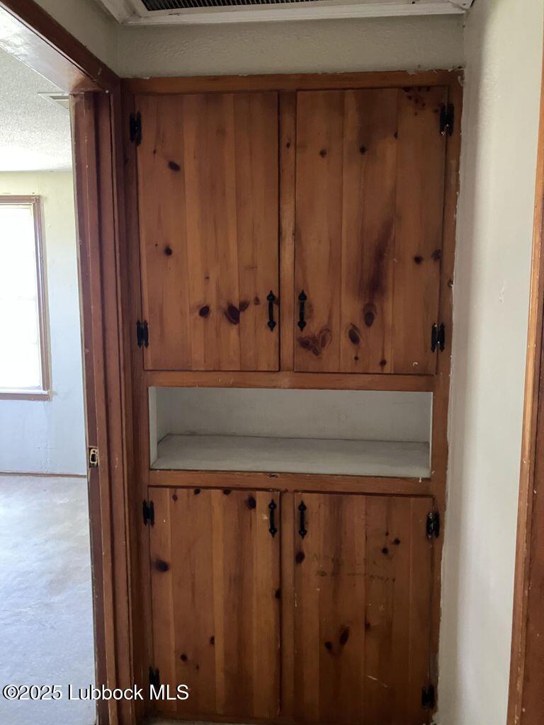 1615 Utica Plainview, TX 79072 - Photo 14 of 26 a view of wooden door