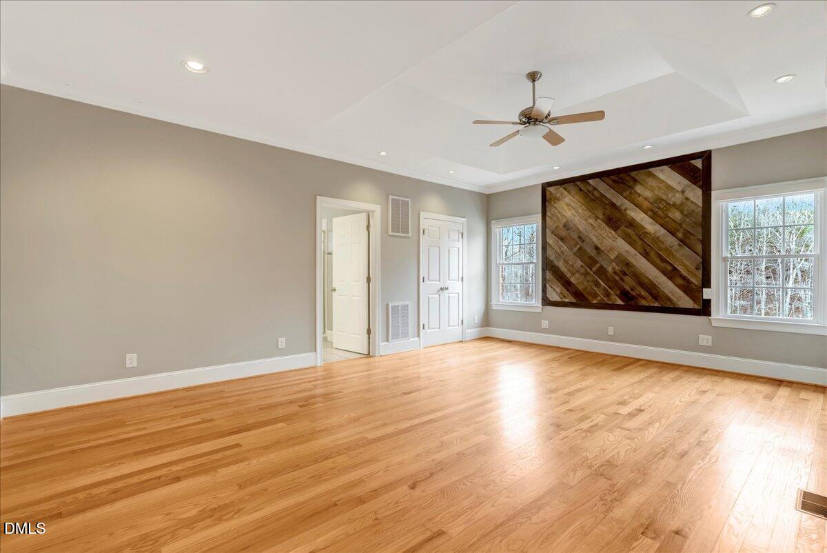 1635 Tommie Daniel Road Oxford, NC 27565 - Photo 18 of 63 wooden floor in an empty room with a window