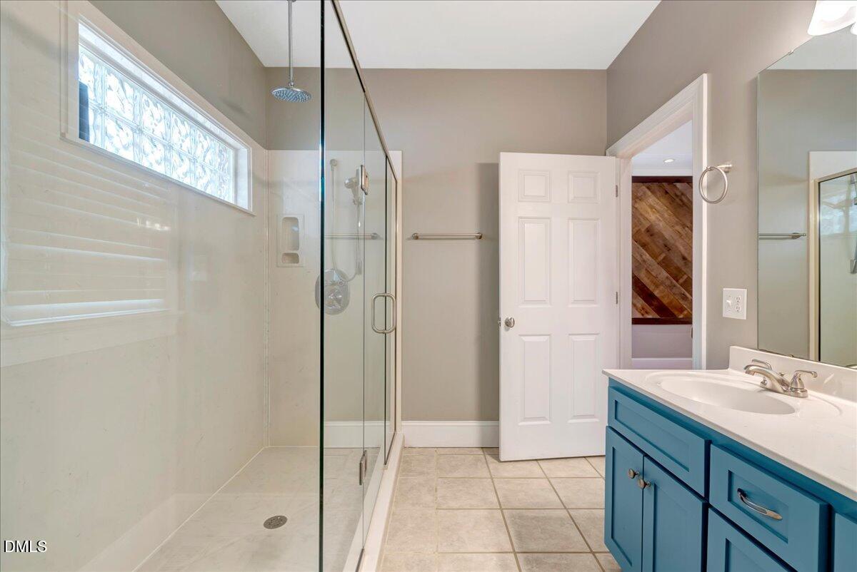1635 Tommie Daniel Road Oxford, NC 27565 - Photo 20 of 63 a bathroom with a shower and a sink