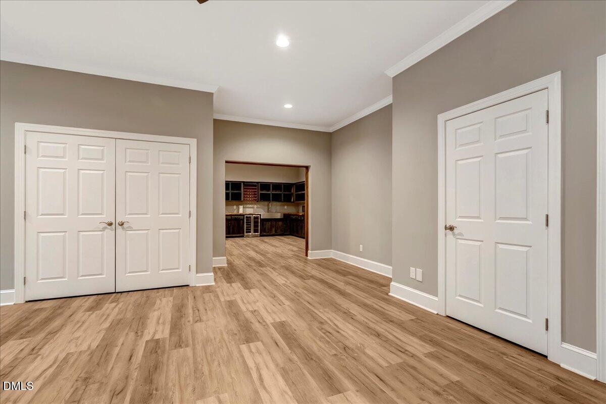 1635 Tommie Daniel Road Oxford, NC 27565 - Photo 38 of 63 a view of empty room with wooden floor and closet