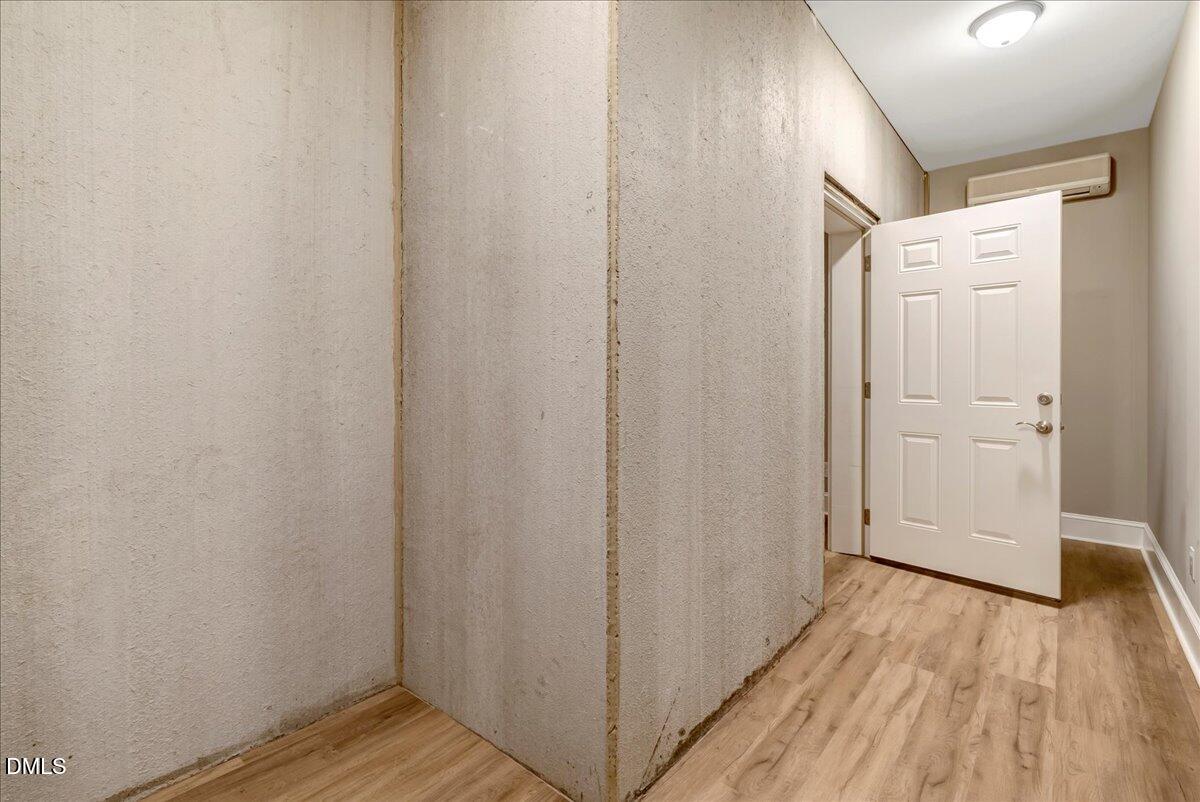 1635 Tommie Daniel Road Oxford, NC 27565 - Photo 42 of 63 a view of a hallway with wooden floor