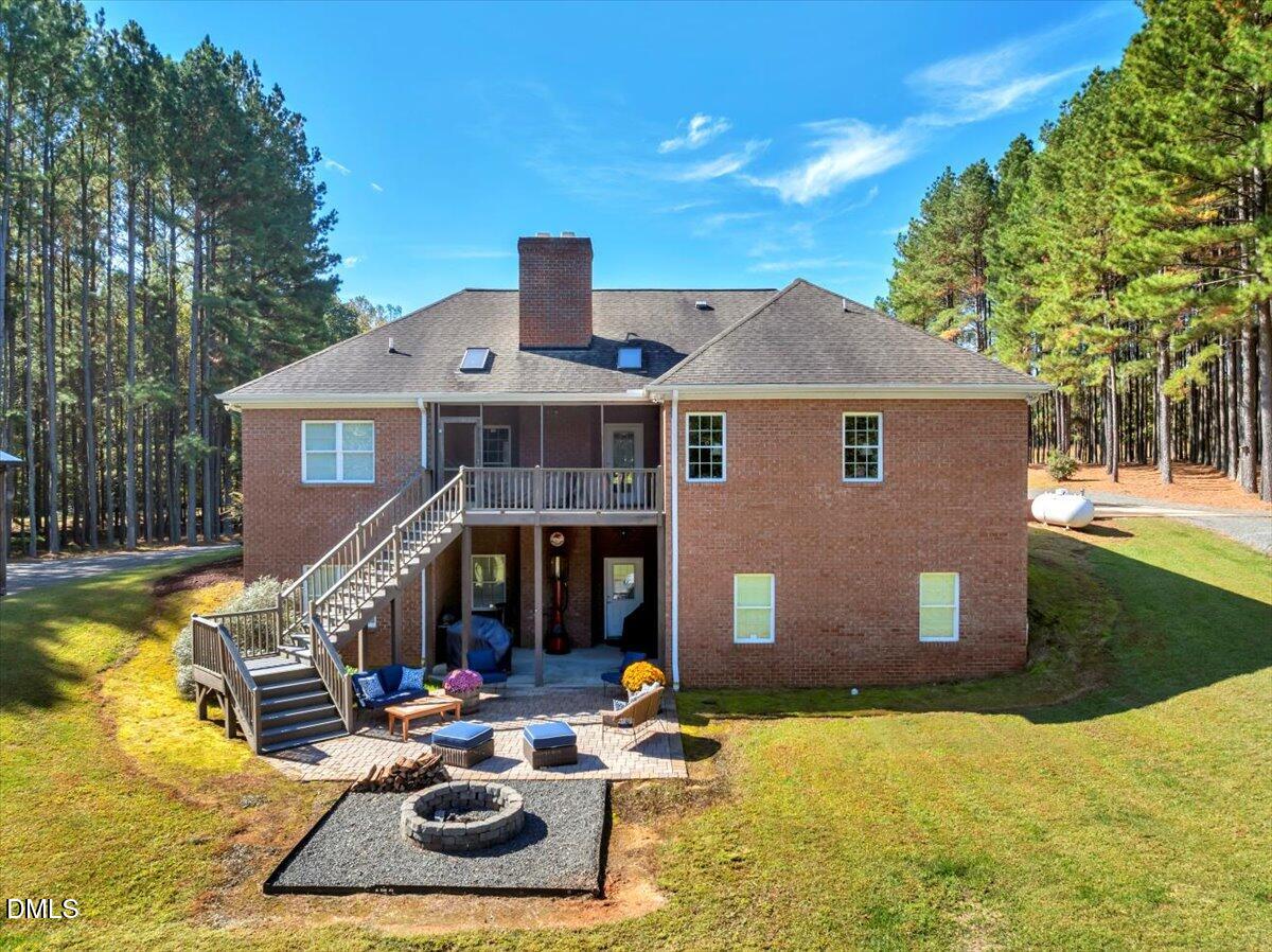 1635 Tommie Daniel Road Oxford, NC 27565 - Photo 46 of 63 a front view of a house with swimming pool having outdoor seating