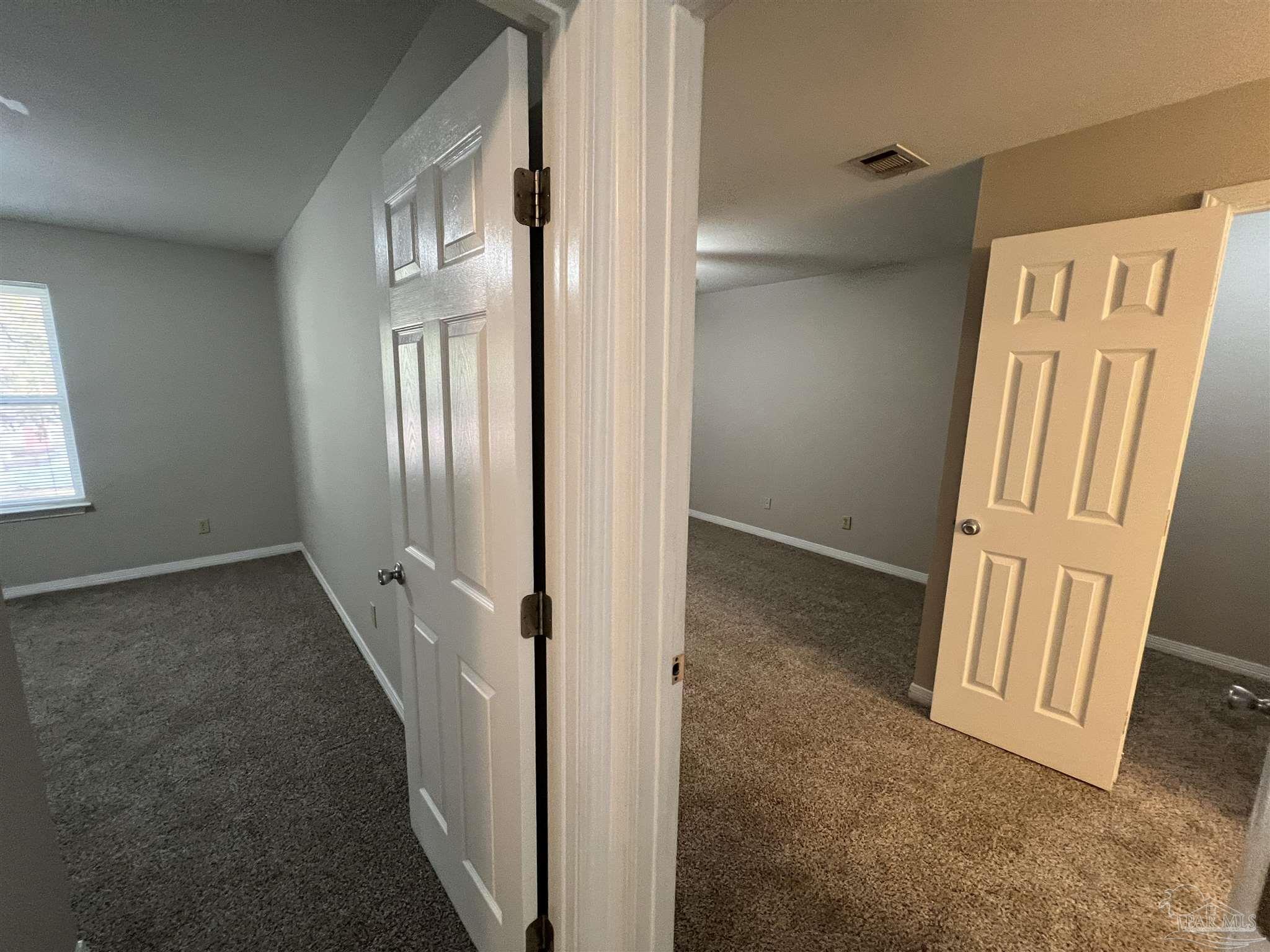 9485 Sunnehanna Boulevard Pensacola, FL 32514 - Photo 13 of 24 an entryway with a door and a window