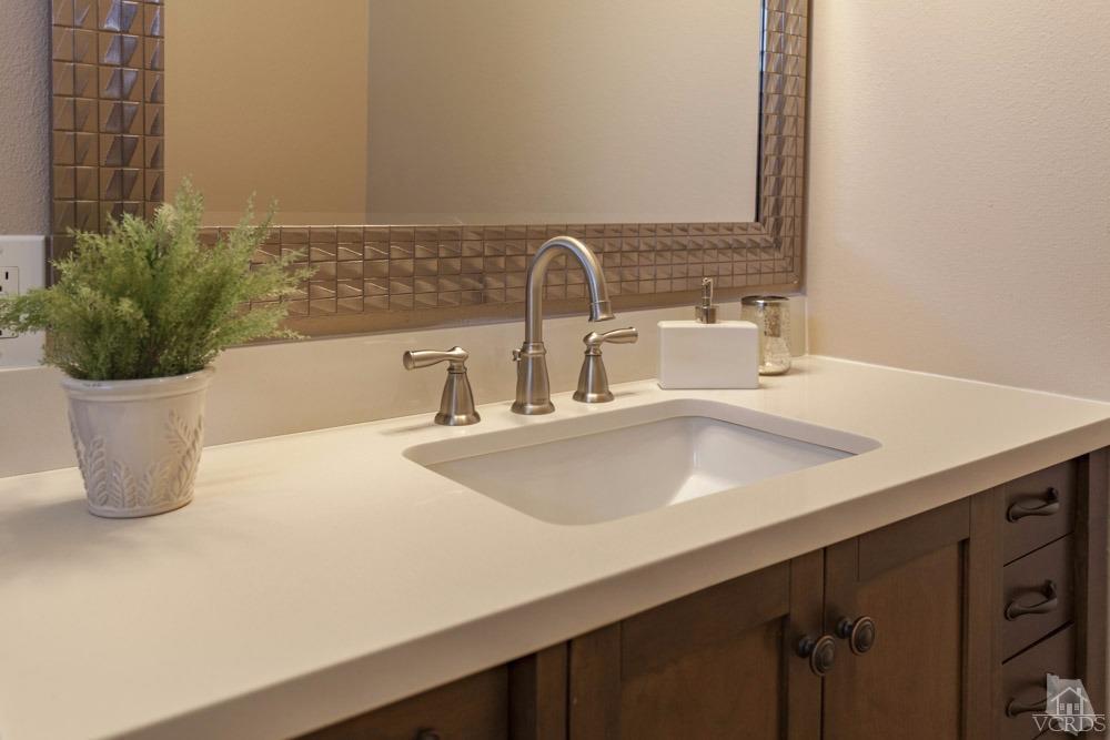 864 Appleton Road Simi Valley, CA 93065 - Photo 28 of 32 a close view of sink and mirror