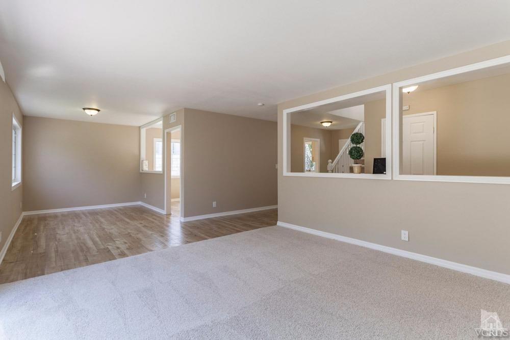 864 Appleton Road Simi Valley, CA 93065 - Photo 7 of 32 an empty room with a window and mirror
