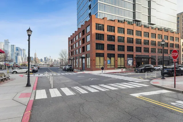 a view of a building and a street
