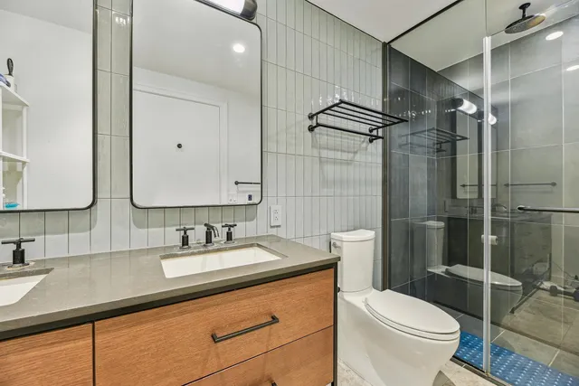 a bathroom with a sink and mirror