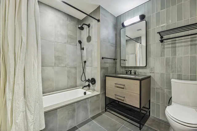 a close view of a utility room with washer and dryer