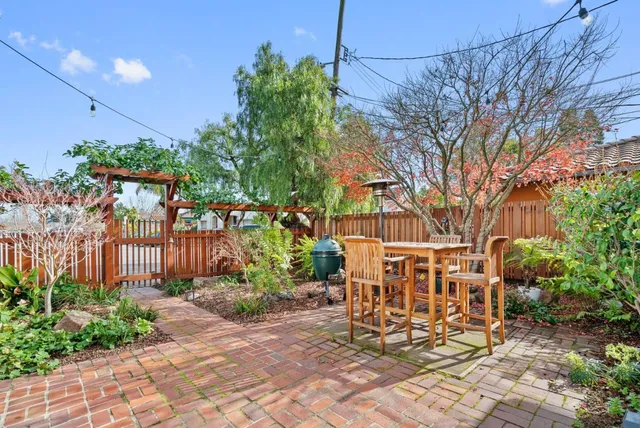 a view of yard with patio