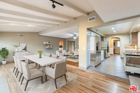 a view of a dining room with furniture