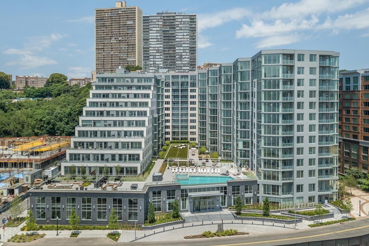 a front view of a building with a street