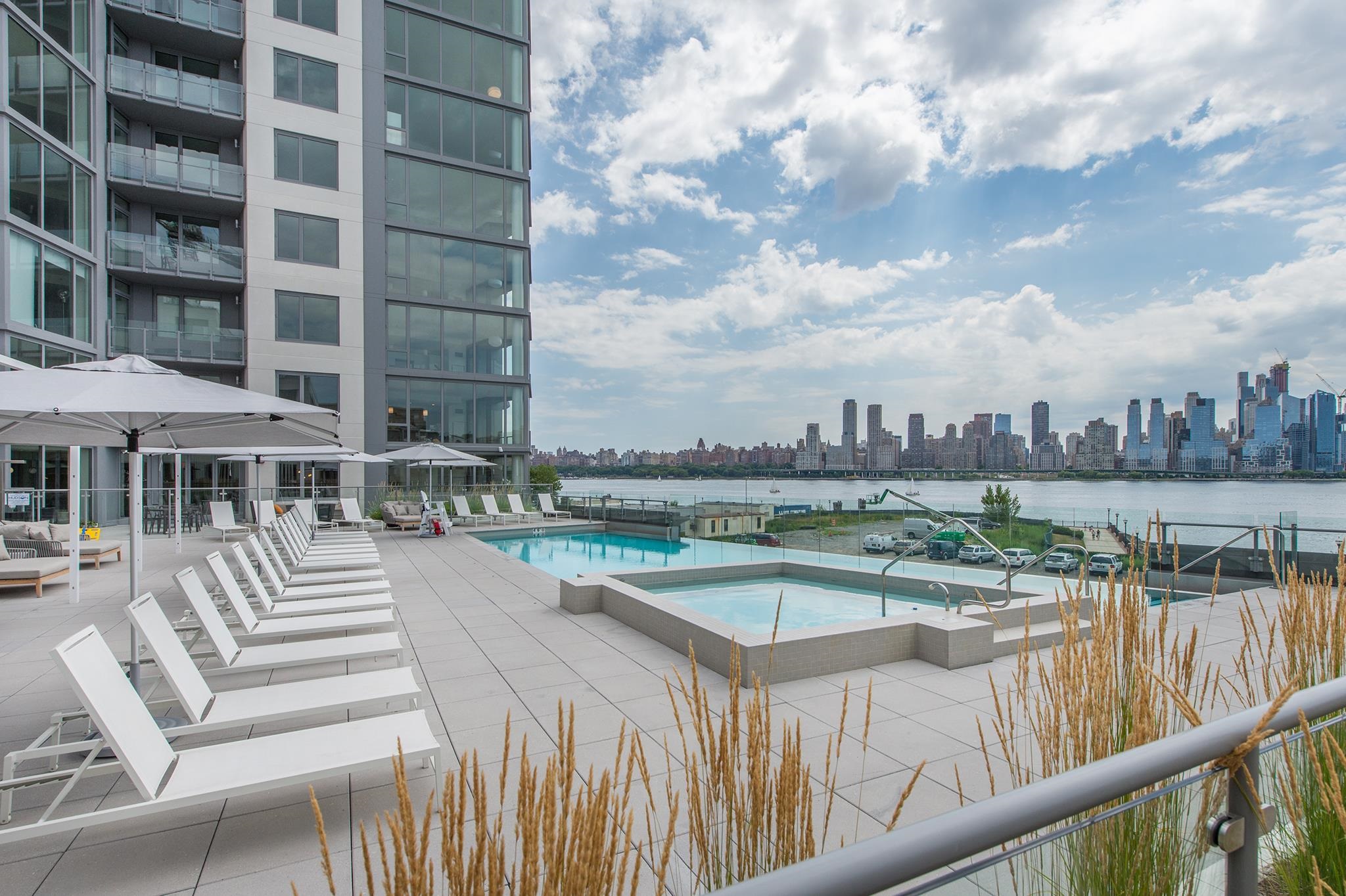 9 Ave At Port Imperial, Unit 925 West New York, NJ 07093 - Photo 11 of 14 a view of swimming pool from a balcony