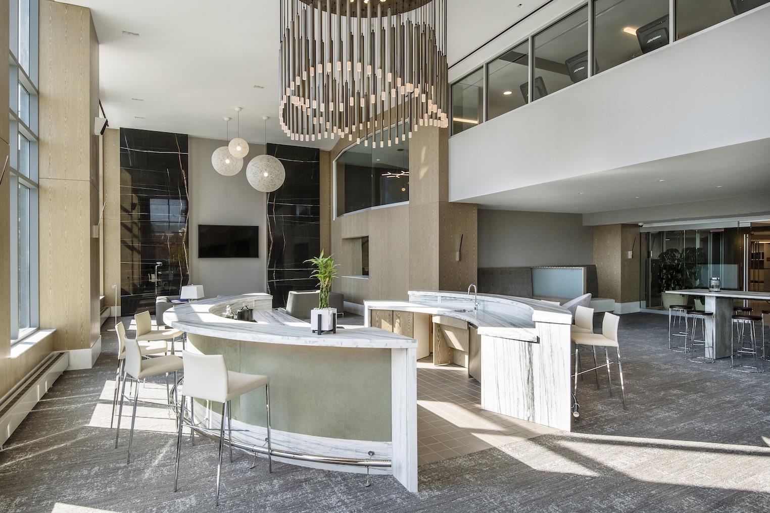 9 Ave At Port Imperial, Unit 925 West New York, NJ 07093 - Photo 4 of 14 a view of a dining room kitchen with table and chairs