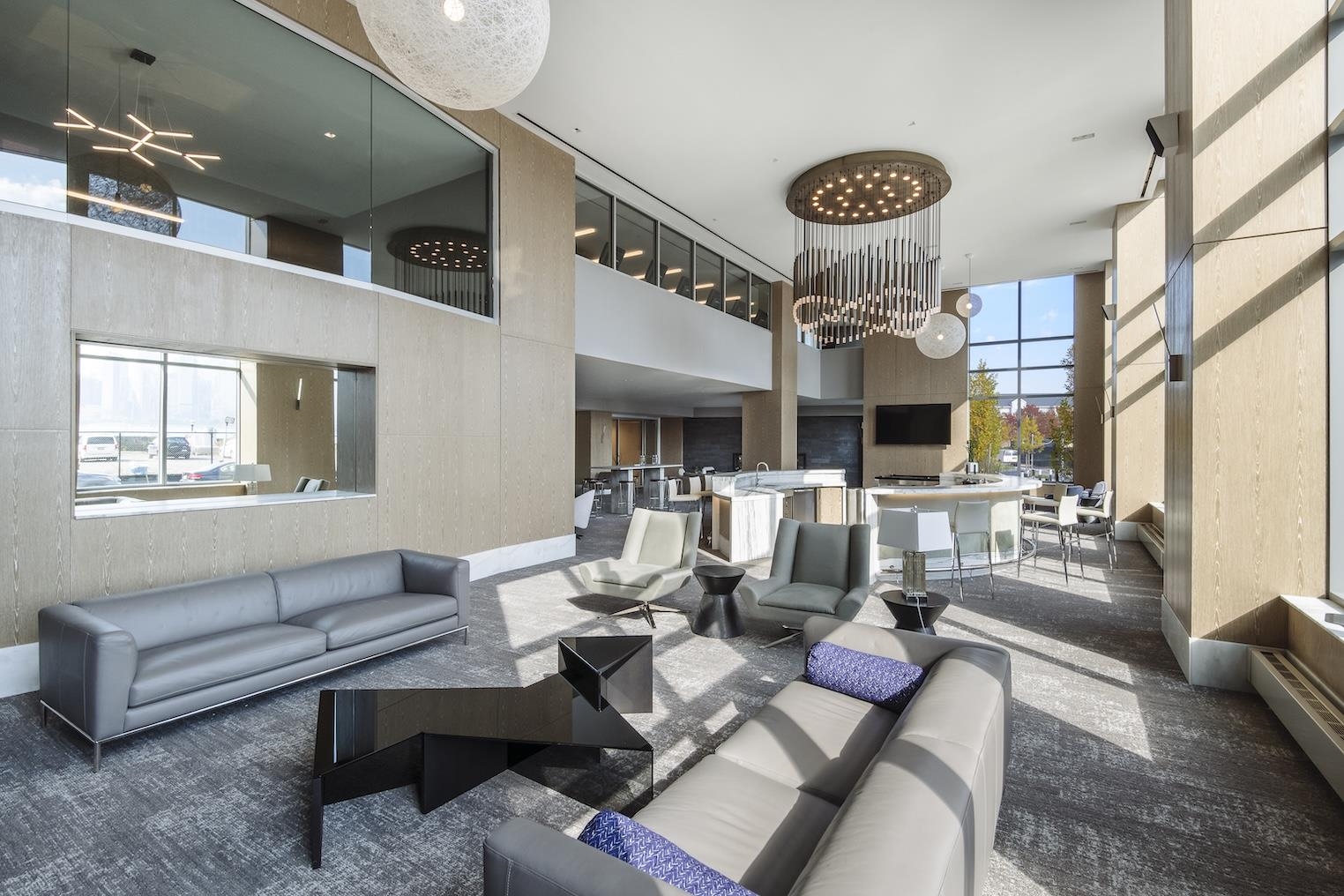 9 Ave At Port Imperial, Unit 925 West New York, NJ 07093 - Photo 5 of 14 a living room with furniture and a large window