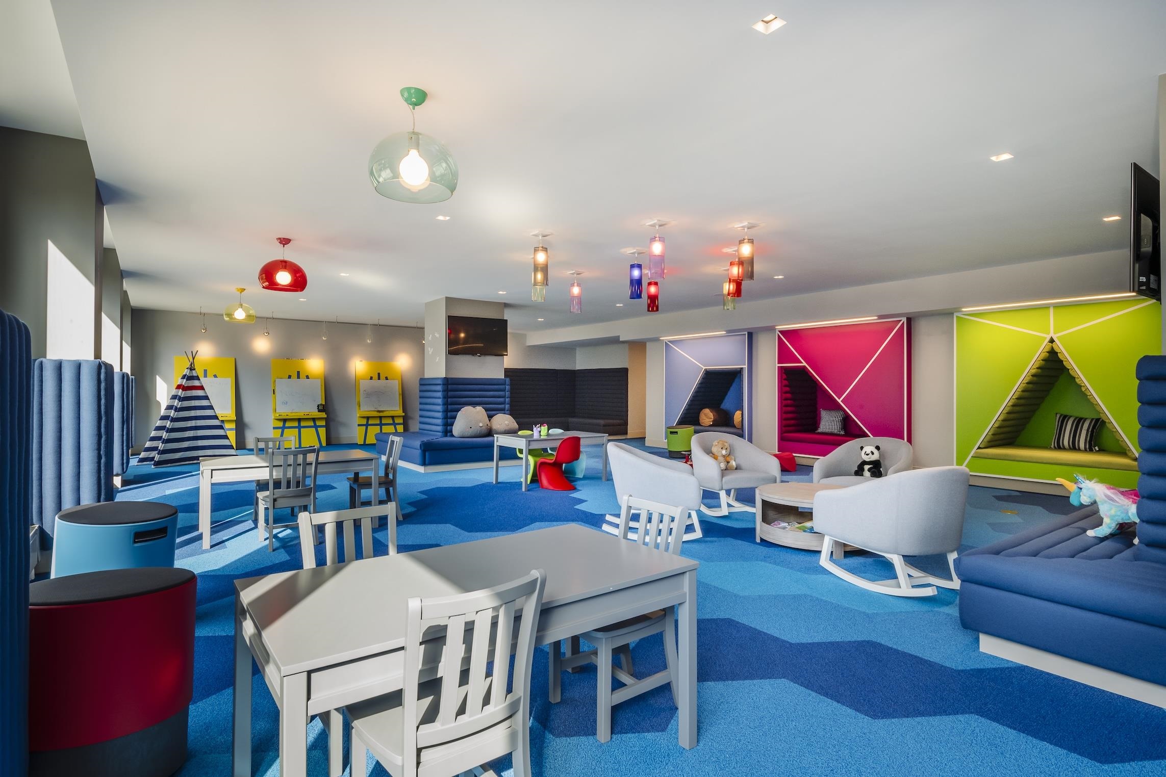 9 Ave At Port Imperial, Unit 925 West New York, NJ 07093 - Photo 6 of 14 a living room with furniture and dining room