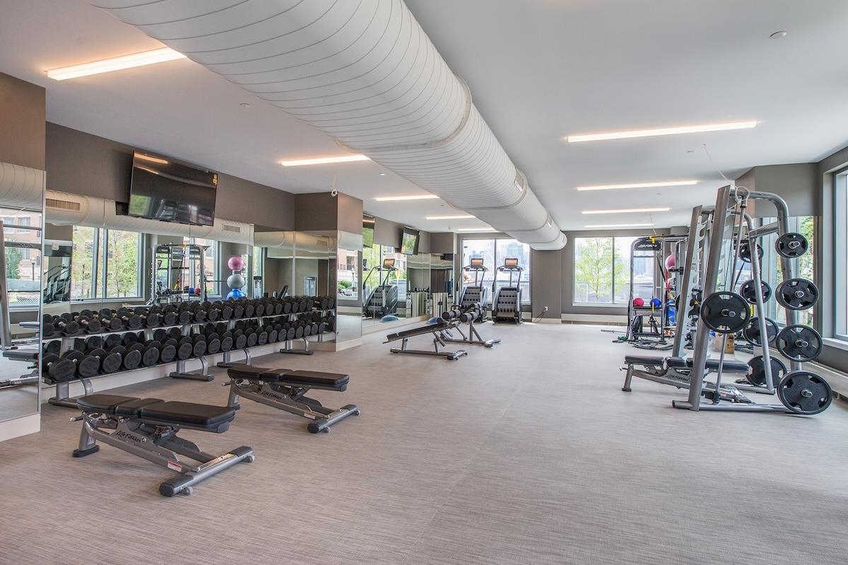 9 Ave At Port Imperial, Unit 925 West New York, NJ 07093 - Photo 7 of 14 a view of a room with gym equipment