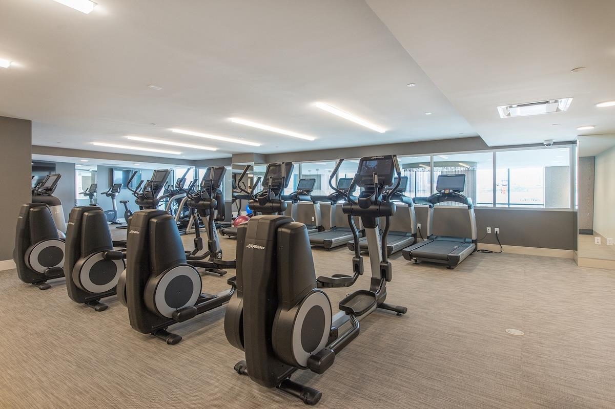 9 Ave At Port Imperial, Unit 925 West New York, NJ 07093 - Photo 8 of 14 a view of a room with gym equipment