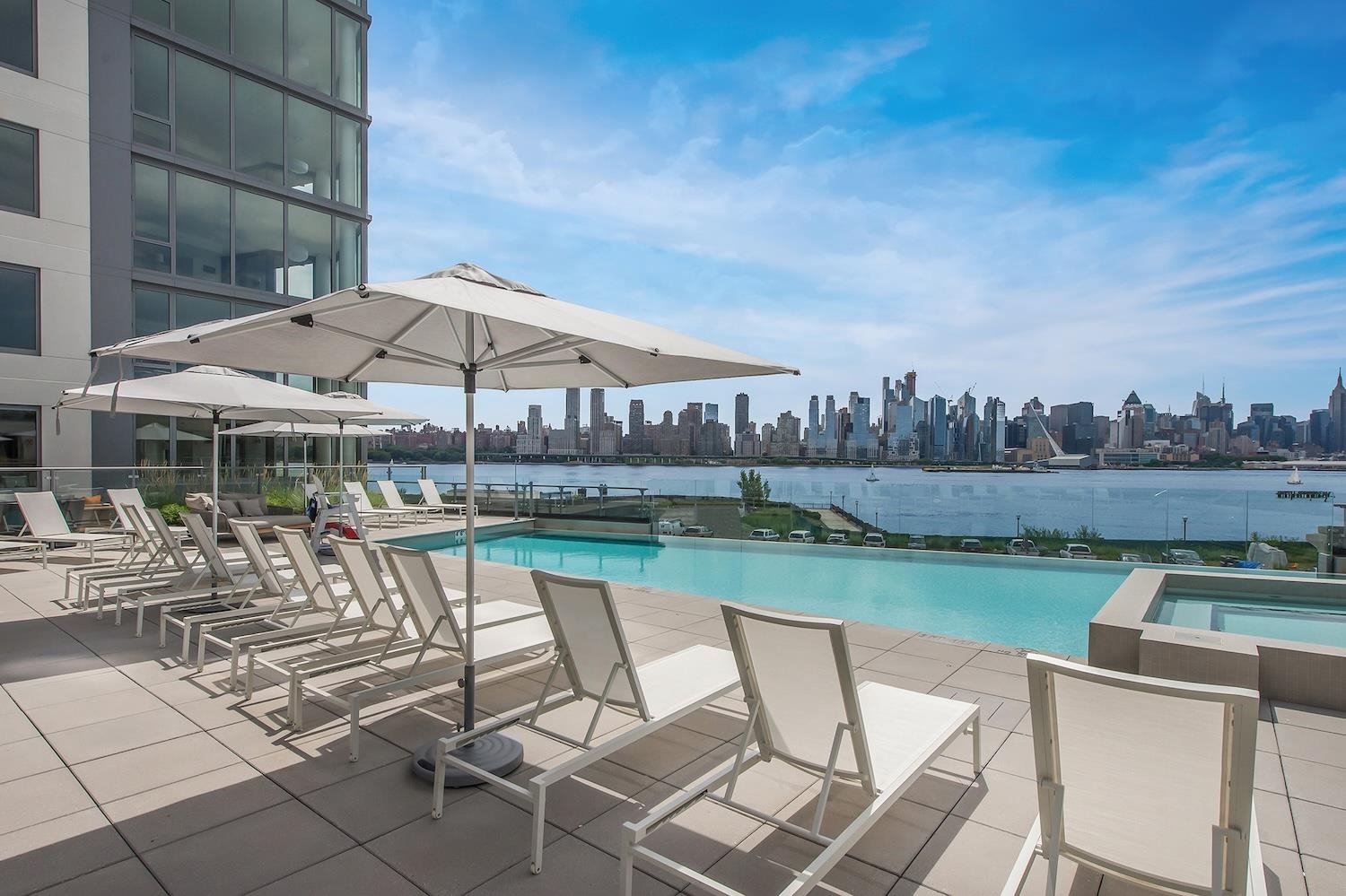9 Ave At Port Imperial, Unit 925 West New York, NJ 07093 - Photo 9 of 14 a view of house with patio and outdoor seating