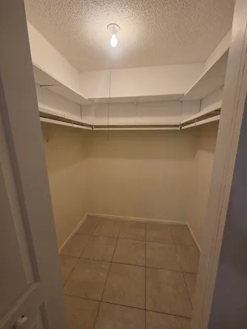 a view of an empty walk in closet