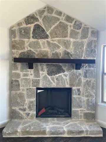 a fireplace with a glass door
