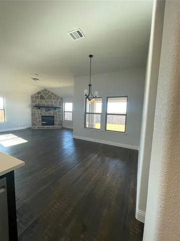 a view of livingroom and kitchen with hardwood floor