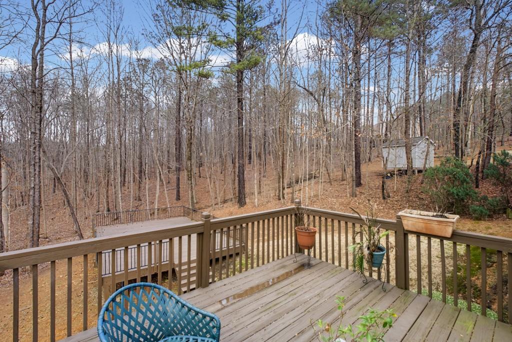 218 Amaranth Court Ball Ground, GA 30107 - Photo 34 of 46 a view of balcony with wooden floor