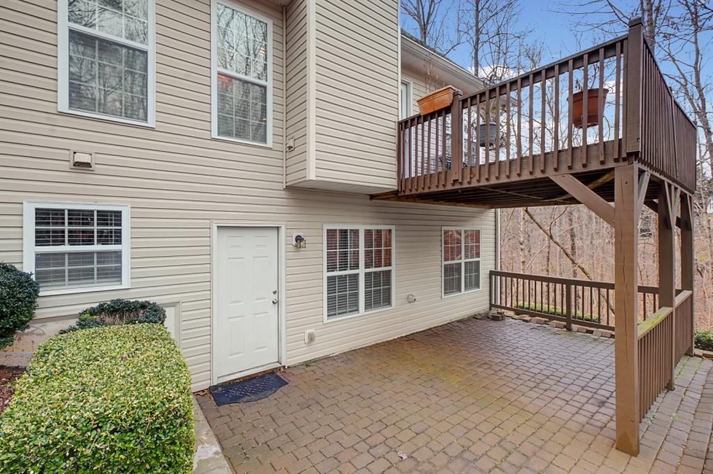218 Amaranth Court Ball Ground, GA 30107 - Photo 35 of 46 a view of a house with a deck