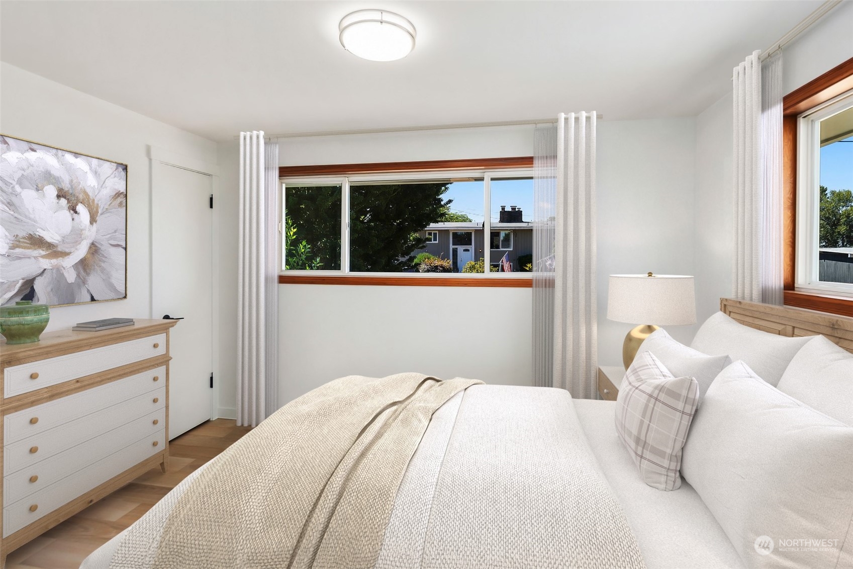 6018 South 119th Street Seattle, WA 98178 - Photo 15 of 33 a bedroom with a bed and a window