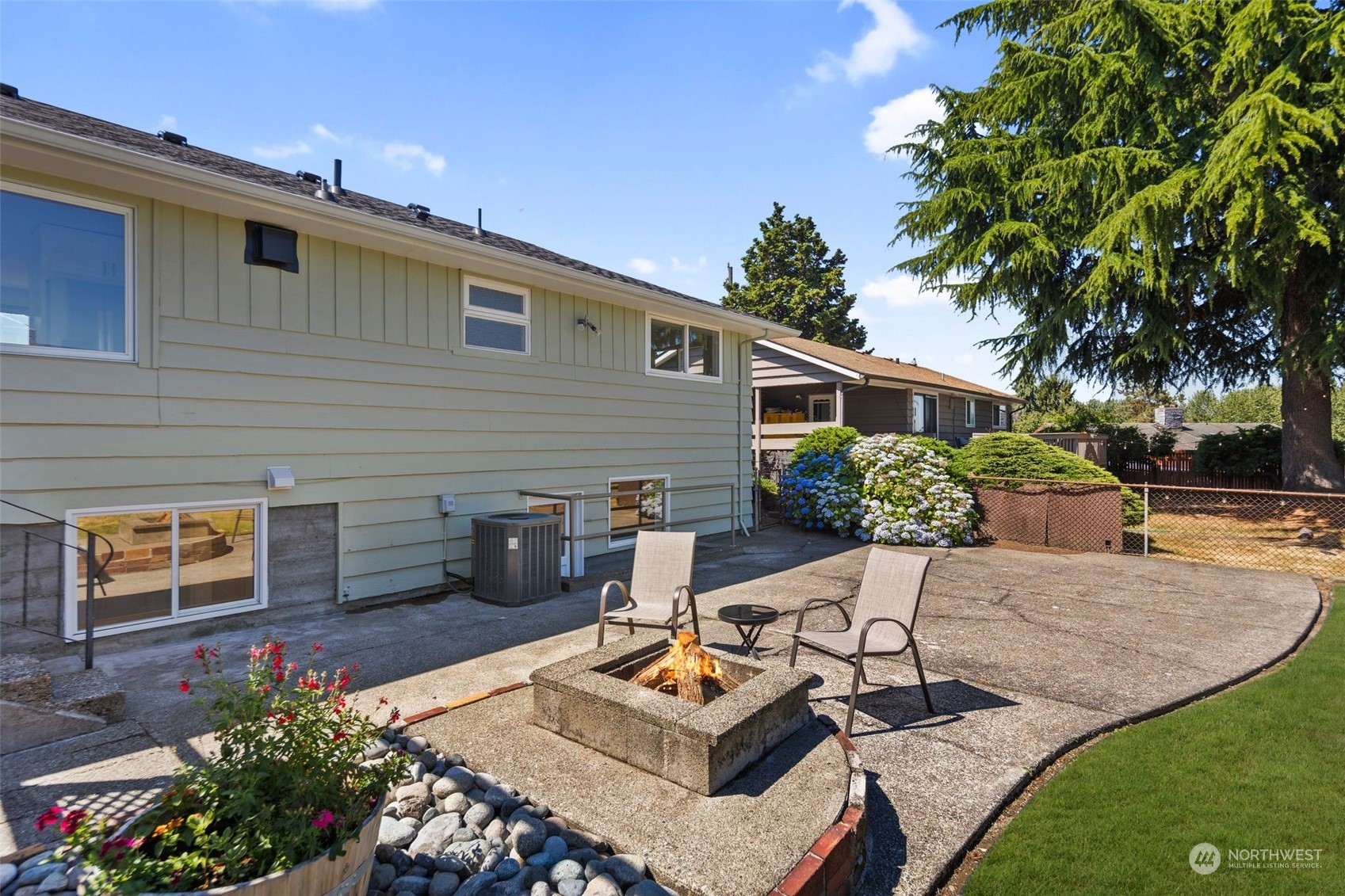 6018 South 119th Street Seattle, WA 98178 - Photo 27 of 33 a backyard of a house with seating space
