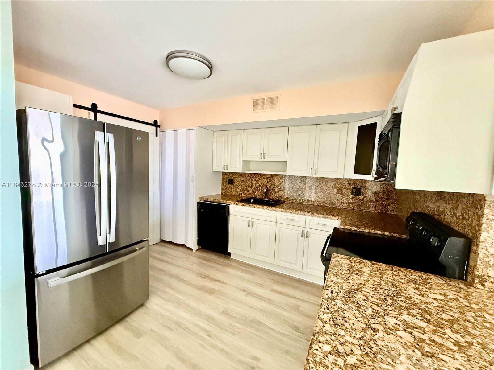 1600 South Ocean Drive, Unit 7B Hollywood, FL 33019 - Photo 3 of 45 Updated kitchen with new SS refrigerator