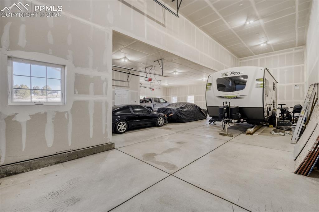 13680 Woodlake Road Elbert, CO 80106 - Photo 38 of 47 Huge garage with RV parking