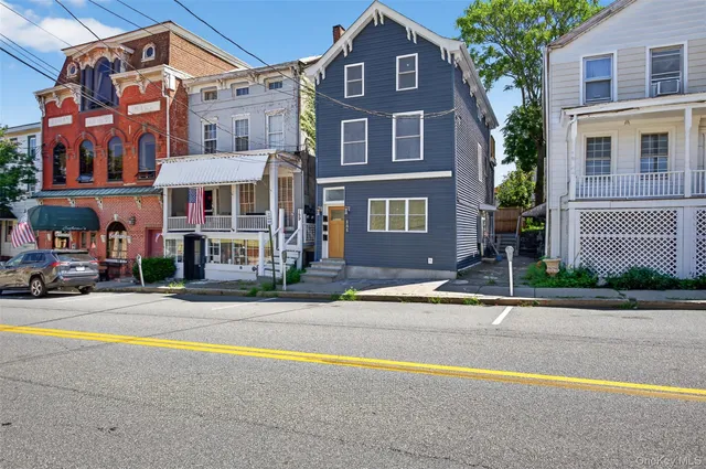 a front view of a building with street view